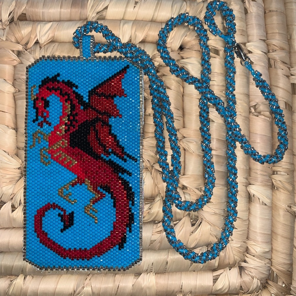 Handmade beaded necklace.  Flying Red dragon.  Price negotiable 👍🏽